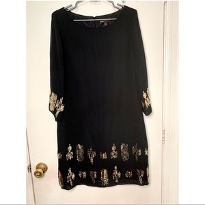 Black chiffon dress with embellished sleeves